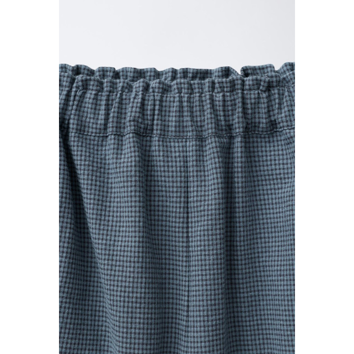 БРЮКИ В КЛЕТКУ ВИШИ С РАЗРЕЗАМИ