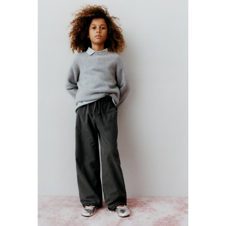 БРЮКИ В КЛЕТКУ ВИШИ С ВОЛАНАМИ