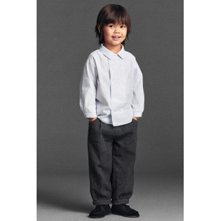 Текстурированные брюки с защипами