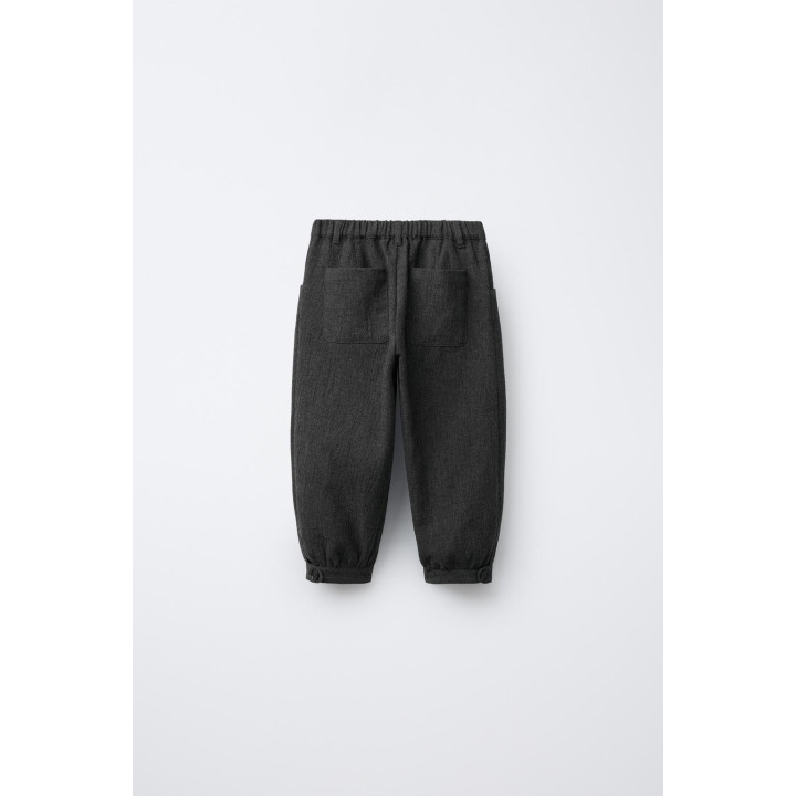 Текстурированные брюки с защипами