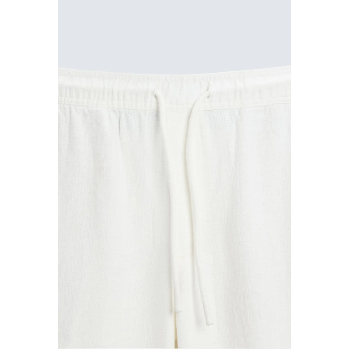 Брюки свободного кроя с текстурой