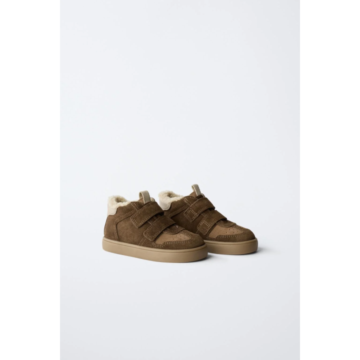 Кожаные кеды на высокой подошве