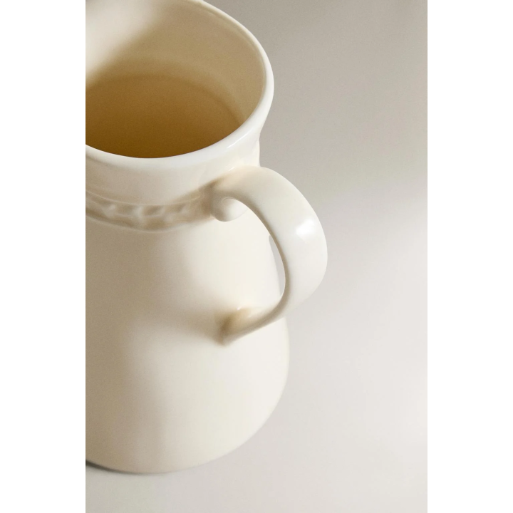RAISED STONEWARE MILK JUG