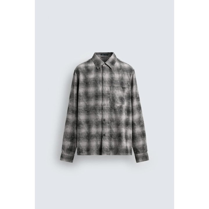 Рубашка в клетку свободного кроя