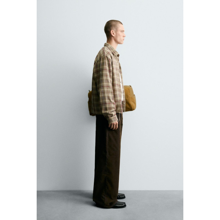 РУБАШКА В КЛЕТКУ С ЭФФЕКТОМ РВАНЫХ ДЕТАЛЕЙ