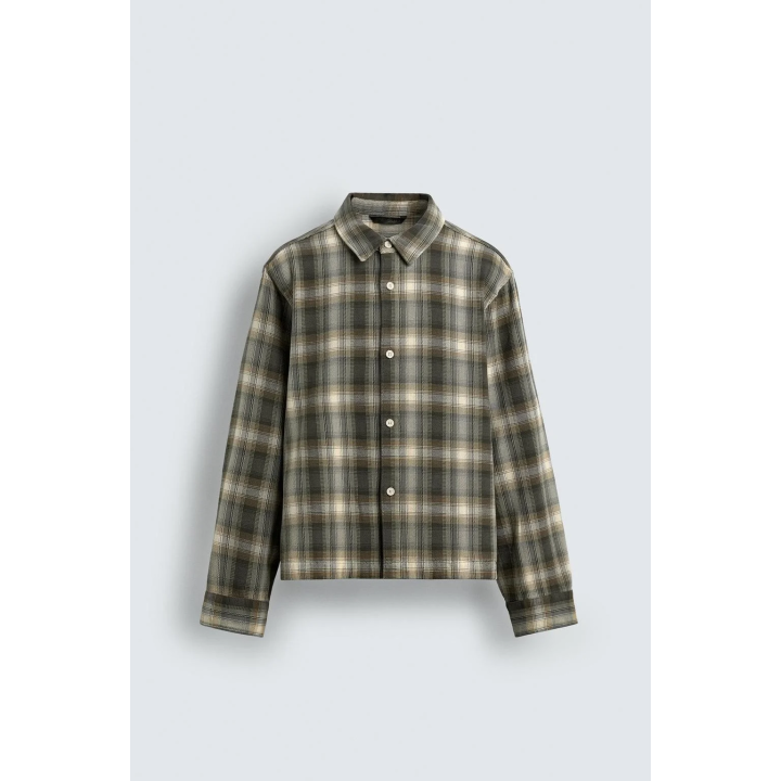 Рубашка в клетку свободного кроя