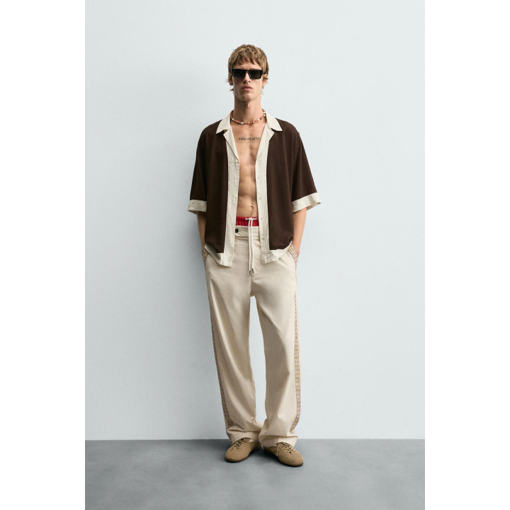 БРЮКИ С ВЫШИТЫМИ ЛАМПАСАМИ