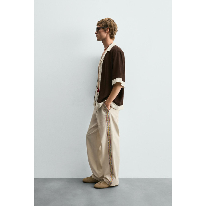 БРЮКИ С ВЫШИТЫМИ ЛАМПАСАМИ