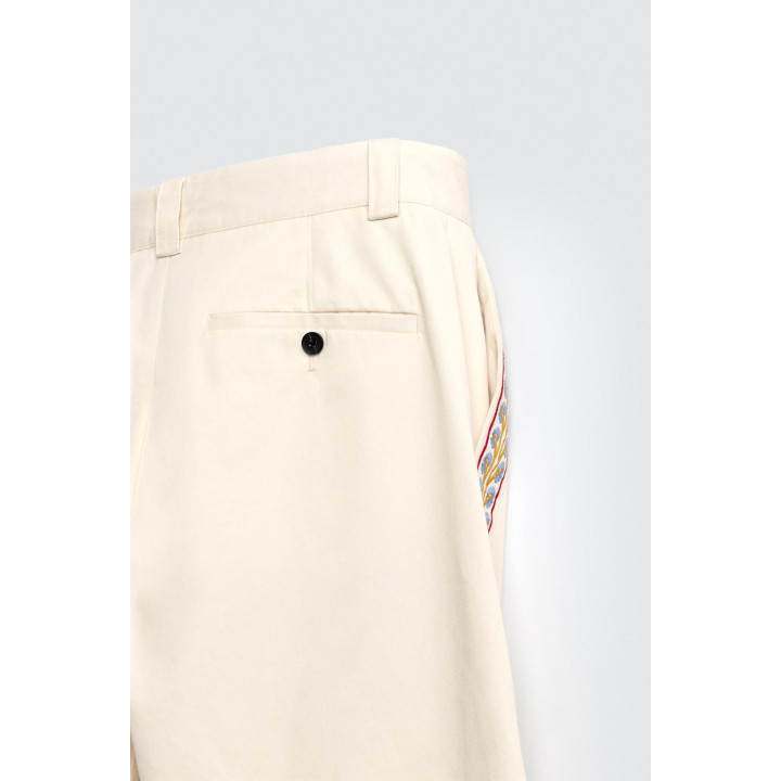 БРЮКИ С ВЫШИТЫМИ ЛАМПАСАМИ