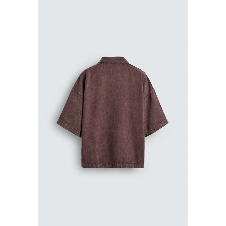 ПОЛО ИЗ РЕЛЬЕФНОЙ ТКАНИ С ЭФФЕКТОМ ПОТЕРТОСТИ