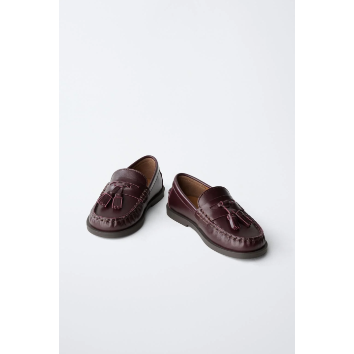 Лоферы с кисточкой из ограниченной коллекции из кожи