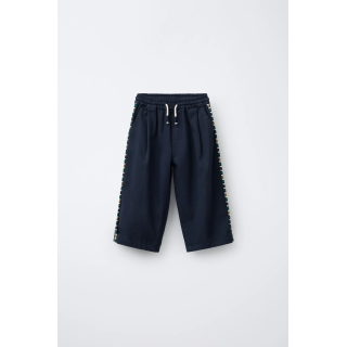 БРЮКИ-КЮЛОТЫ С БОКОВОЙ ВЫШИВКОЙ