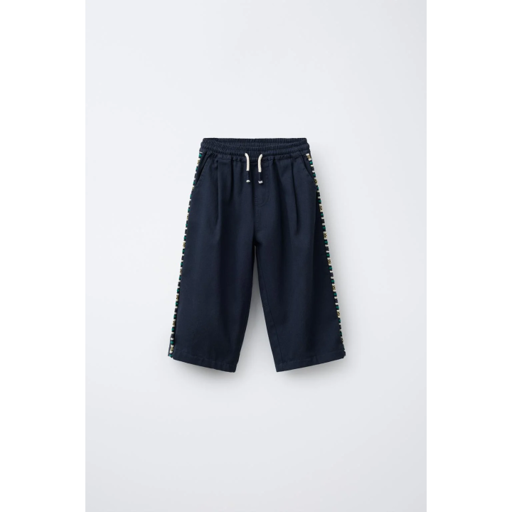 БРЮКИ-КЮЛОТЫ С БОКОВОЙ ВЫШИВКОЙ