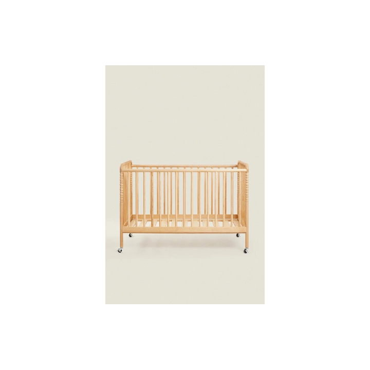 CARVED WOODEN COT WITH WHEELS