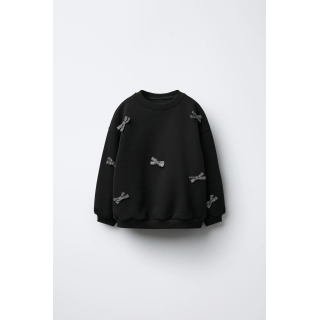 ТОЛСТОВКА С БАНТАМИ И БЛЕСТКАМИ