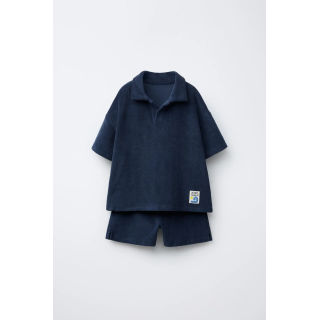 Комплект поло и бермуды из махровой ткани с лейблом