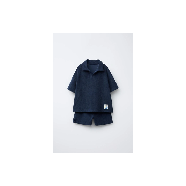 Комплект поло и бермуды из махровой ткани с лейблом