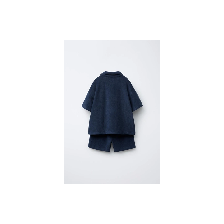 Комплект поло и бермуды из махровой ткани с лейблом