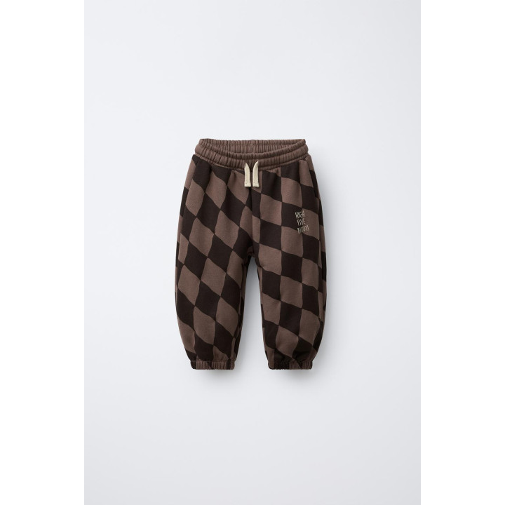 БРЮКИ ИЗ МЯГКОЙ ТКАНИ В РОМБЫ