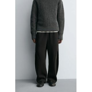 Брюки свободного кроя с плиссированными шарами эффекта неопрена