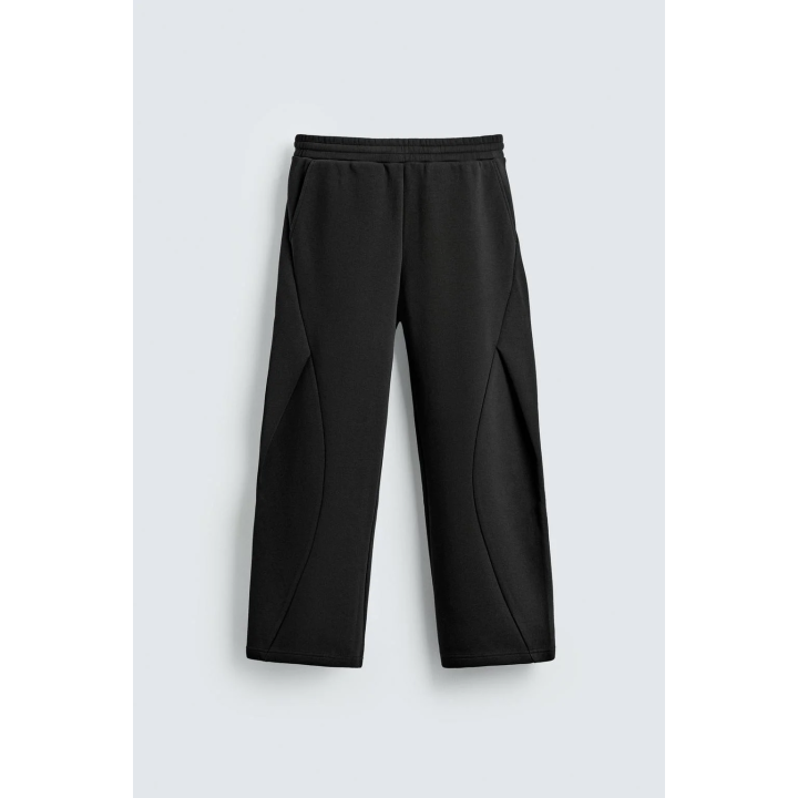 Брюки свободного кроя с плиссированными шарами эффекта неопрена