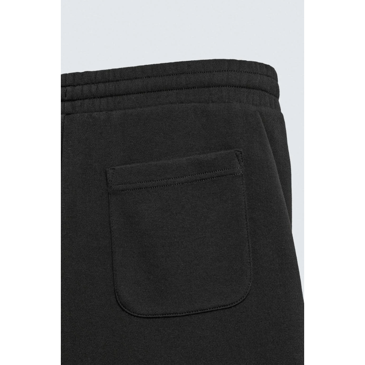 Брюки свободного кроя с плиссированными шарами эффекта неопрена