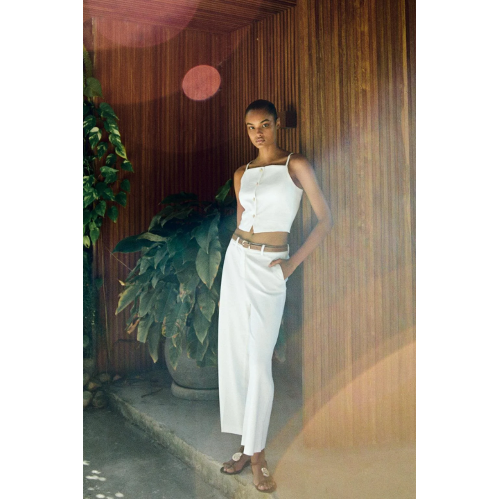 КОРОТКИЙ ЖИЛЕТ НА БРЕТЕЛЯХ