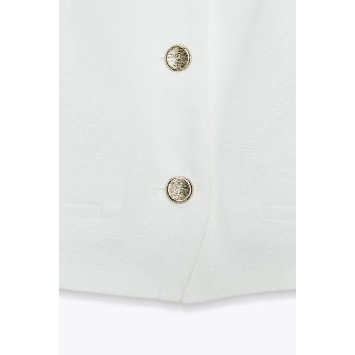 КОРОТКИЙ ЖИЛЕТ НА БРЕТЕЛЯХ