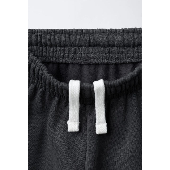 БРЮКИ-ДЖОГГЕРЫ С ТЕКСТОВЫМ ПРИНТОМ