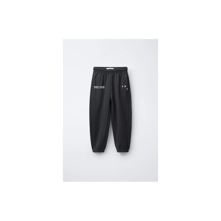 БРЮКИ-ДЖОГГЕРЫ С ТЕКСТОВЫМ ПРИНТОМ