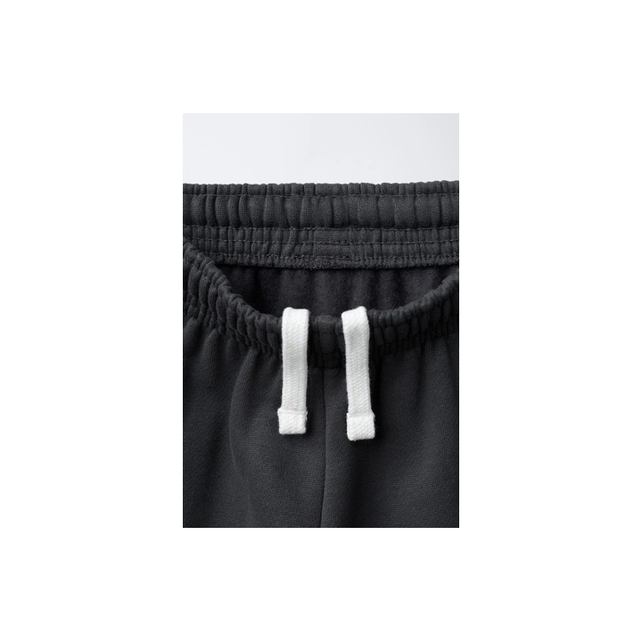 БРЮКИ-ДЖОГГЕРЫ С ТЕКСТОВЫМ ПРИНТОМ