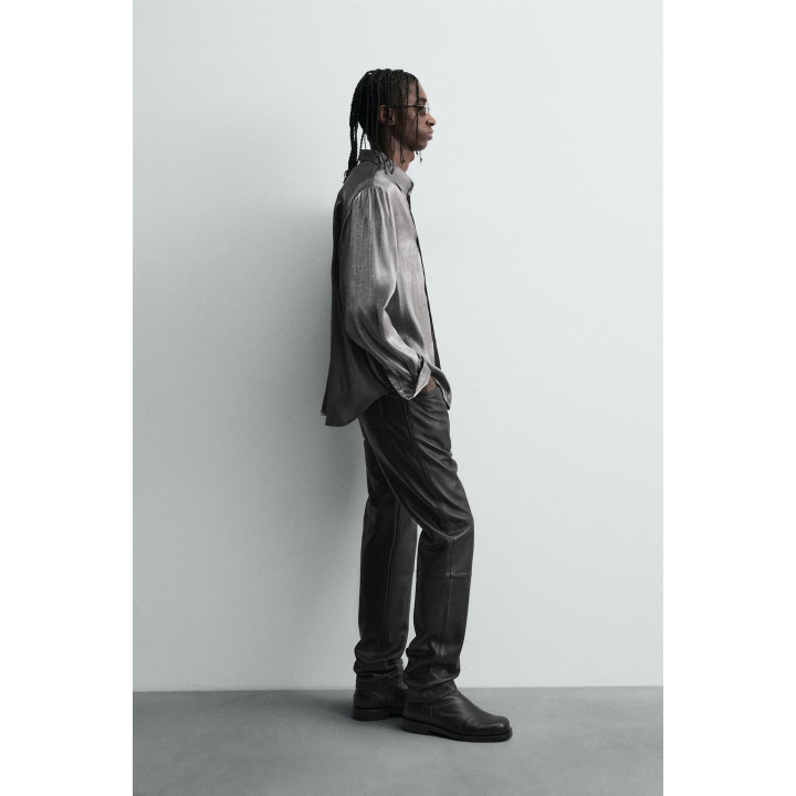 СВЕРКАЮЩАЯ РУБАШКА СТРУЯЩЕГОСЯ ПОКРОЯ