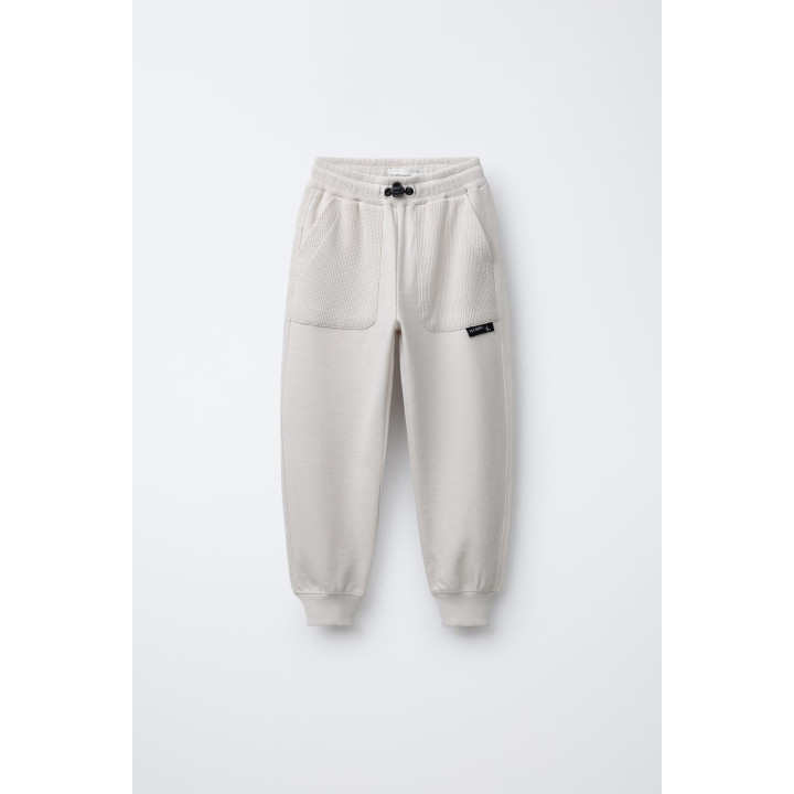 КОМБИНИРОВАННЫЕ БРЮКИ-ДЖОГГЕРЫ ИЗ ВАФЕЛЬНОЙ ТКАНИ