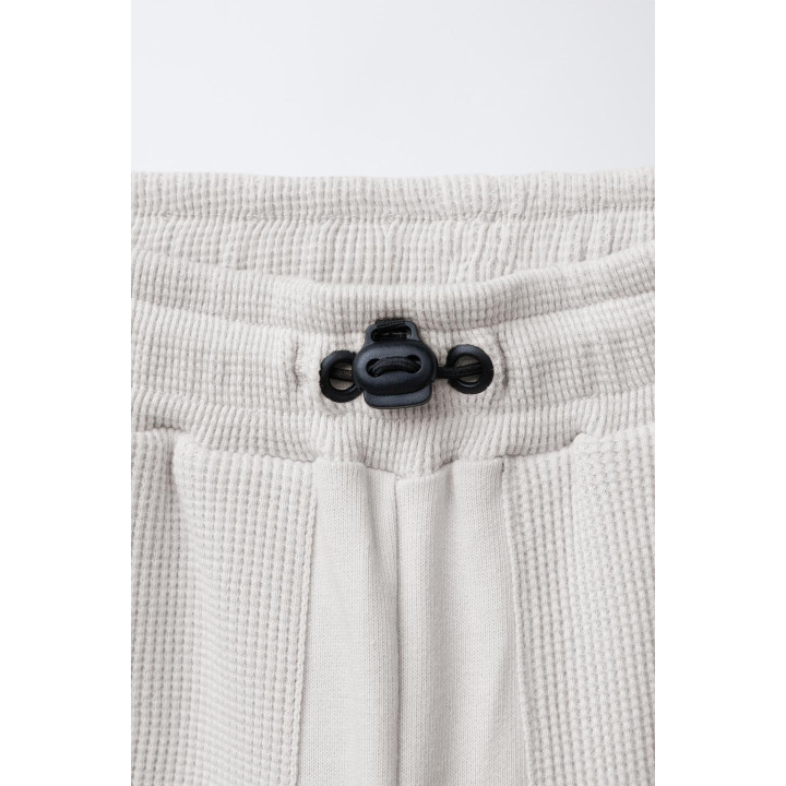 КОМБИНИРОВАННЫЕ БРЮКИ-ДЖОГГЕРЫ ИЗ ВАФЕЛЬНОЙ ТКАНИ