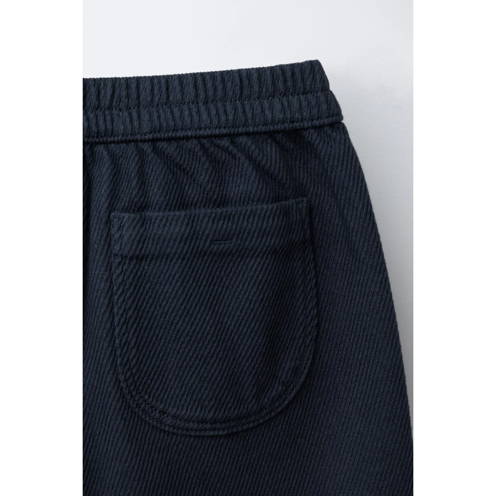 БРЮКИ ИЗ МЯГКОЙ ТКАНИ С ПУГОВИЦАМИ