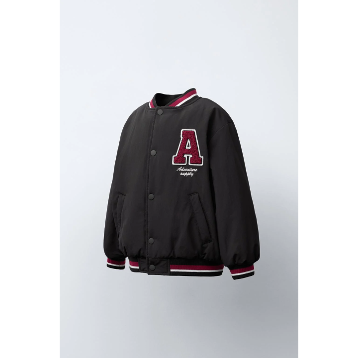 БОМБЕР С ПОДКЛАДКОЙ ИЗ ИСКУССТВЕННОЙ ОВЧИНЫ С НАШИВКОЙ