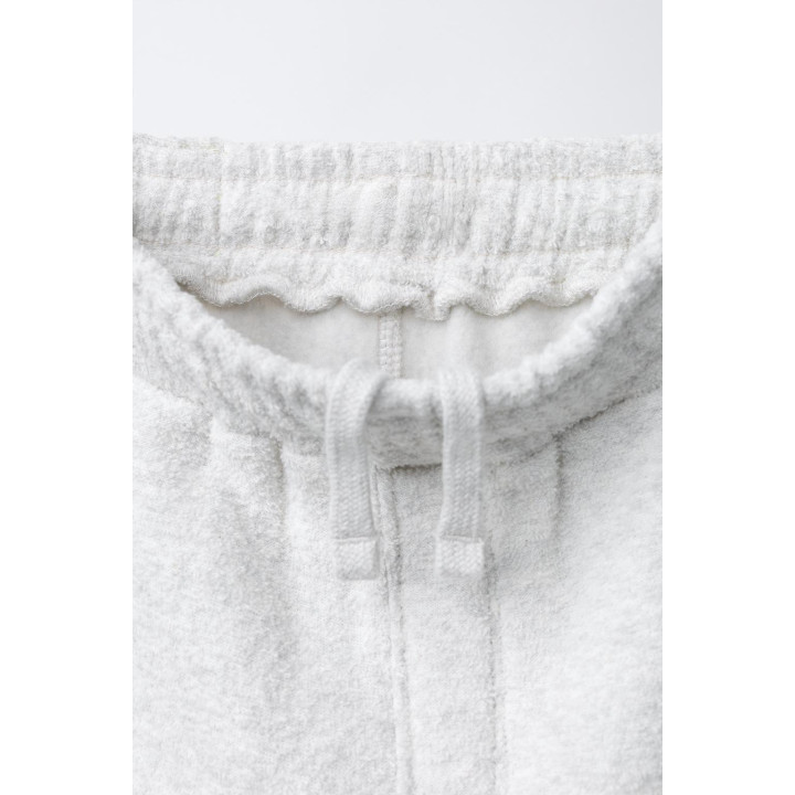 Набор поло и широких брюк с текстурой