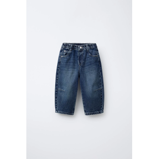 Джинсы с защипами на пуговицах