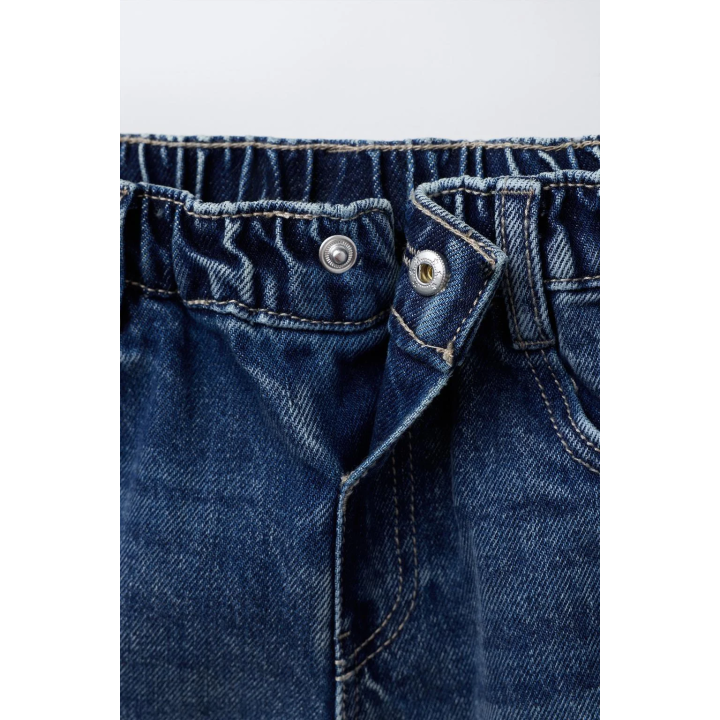 Джинсы с защипами на пуговицах