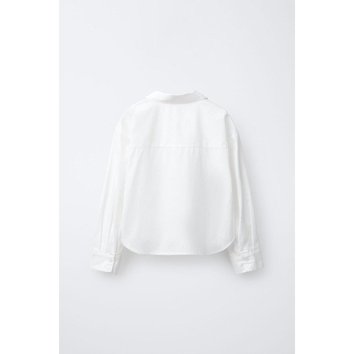 УКОРОЧЕННАЯ РУБАШКА С БАНТИКАМИ И СТРАЗАМИ