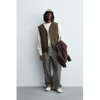 СТЕГАНЫЙ ЖИЛЕТ С ОТСТРОЧКОЙ