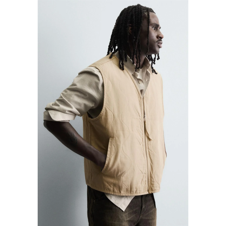 Жилет с вышитыми швами и обработкой под старину