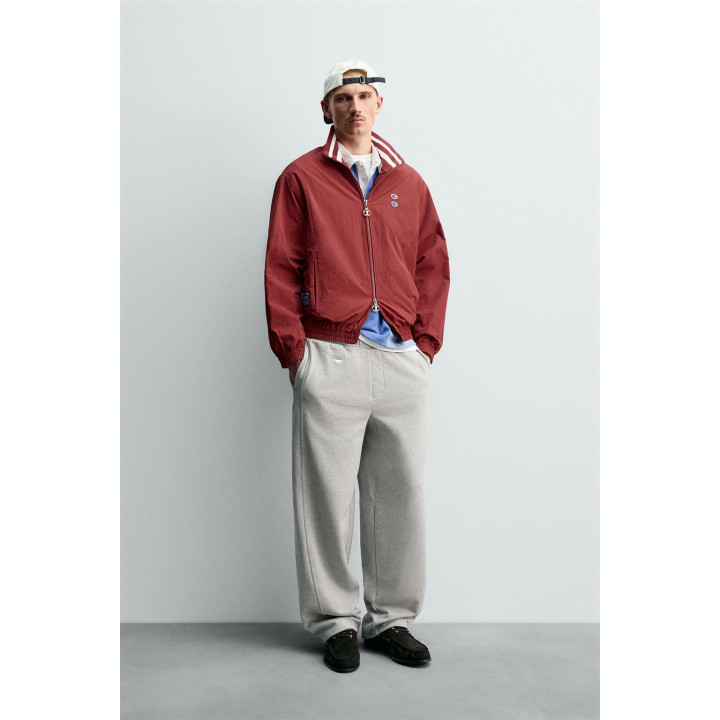 ТЕХНИЧЕСКАЯ КУРТКА С НАШИВКАМИ CHAMPION ® X ZARA