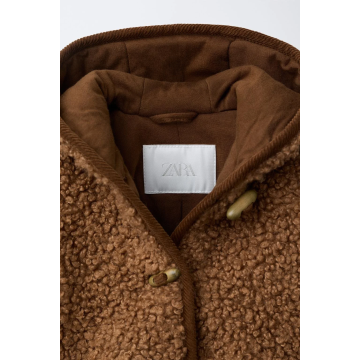 КУРТКА ИЗ ИСКУССТВЕННОЙ ОВЧИНЫ С НАВЕСНЫМИ ПЕТЛЯМИ