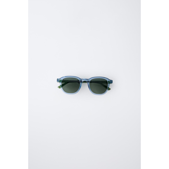 СОЛНЦЕЗАЩИТНЫЕ ОЧКИ С ПРОЗРАЧНОЙ ОПРАВОЙ