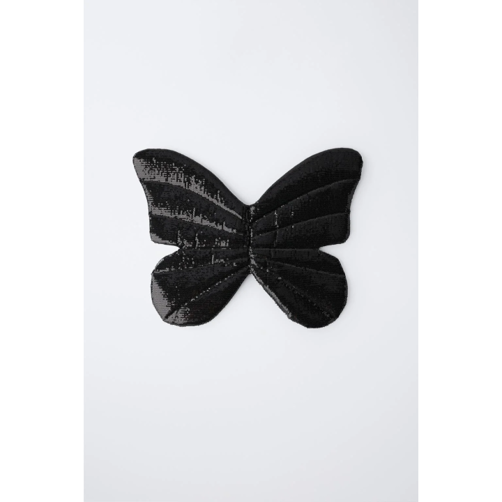 Платье с крыльями бабочки и пайетками