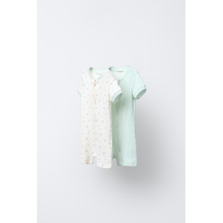 Две пижамы-комбинезона в клетку и с цветочным принтом