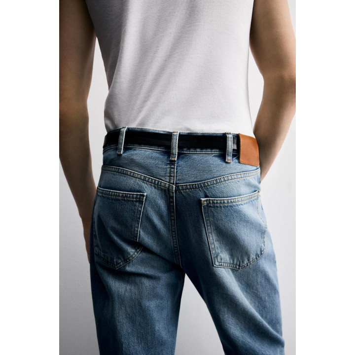 Джинсы прямого кроя со штаниной-клеш