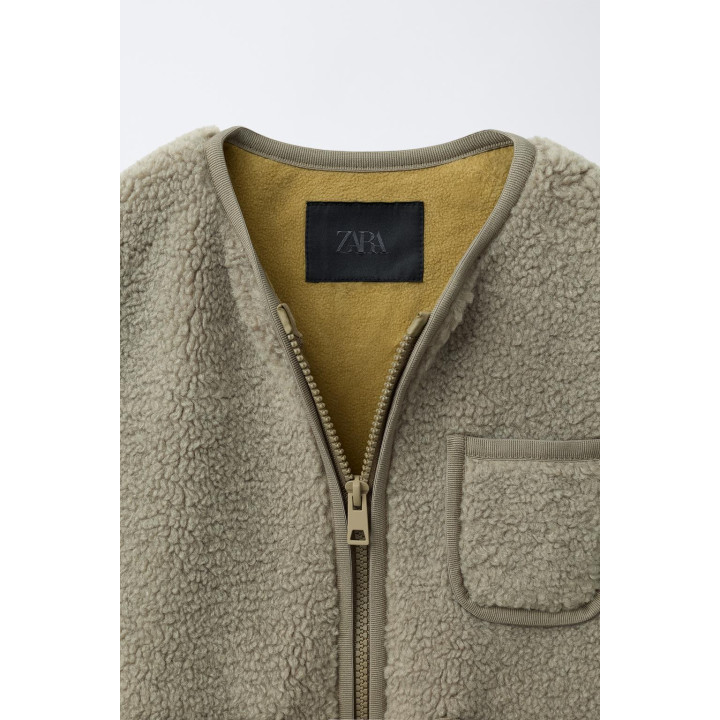 ЖИЛЕТ ИЗ ИСКУССТВЕННОЙ ОВЧИНЫ SNOOPY PEANUTS™