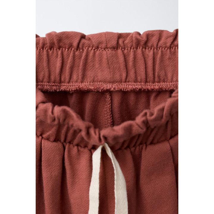 БРЮКИ-БАГГИ С ВЯЗАНЫМ ЭЛЕМЕНТОМ